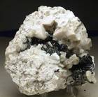"SCHORL and K-FELDSPAR"